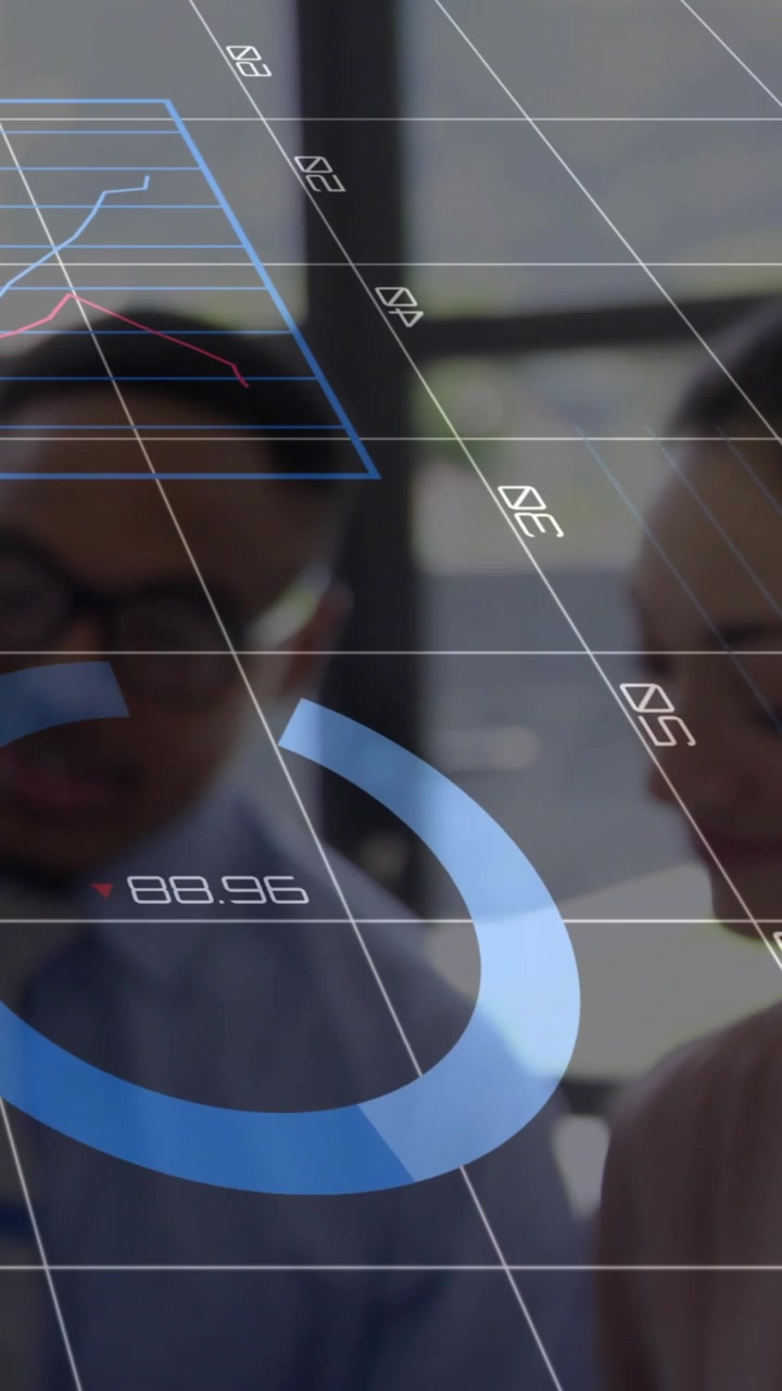 Vertical video: HUD overlay appearing, colleagues leaning and analyzing business charts on device