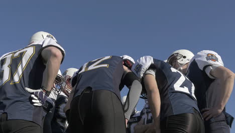 football team huddling