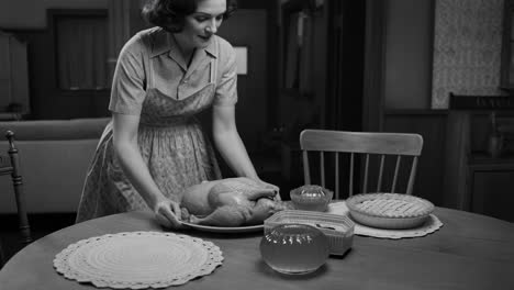 a woman in a retro kitchen preparing a turkey and pie for a meal