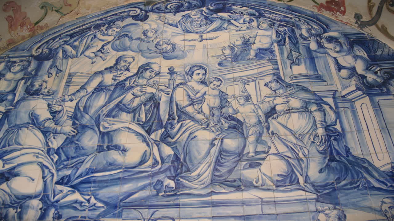 azulejo painting of the holy family with jesus in the centre wide angle