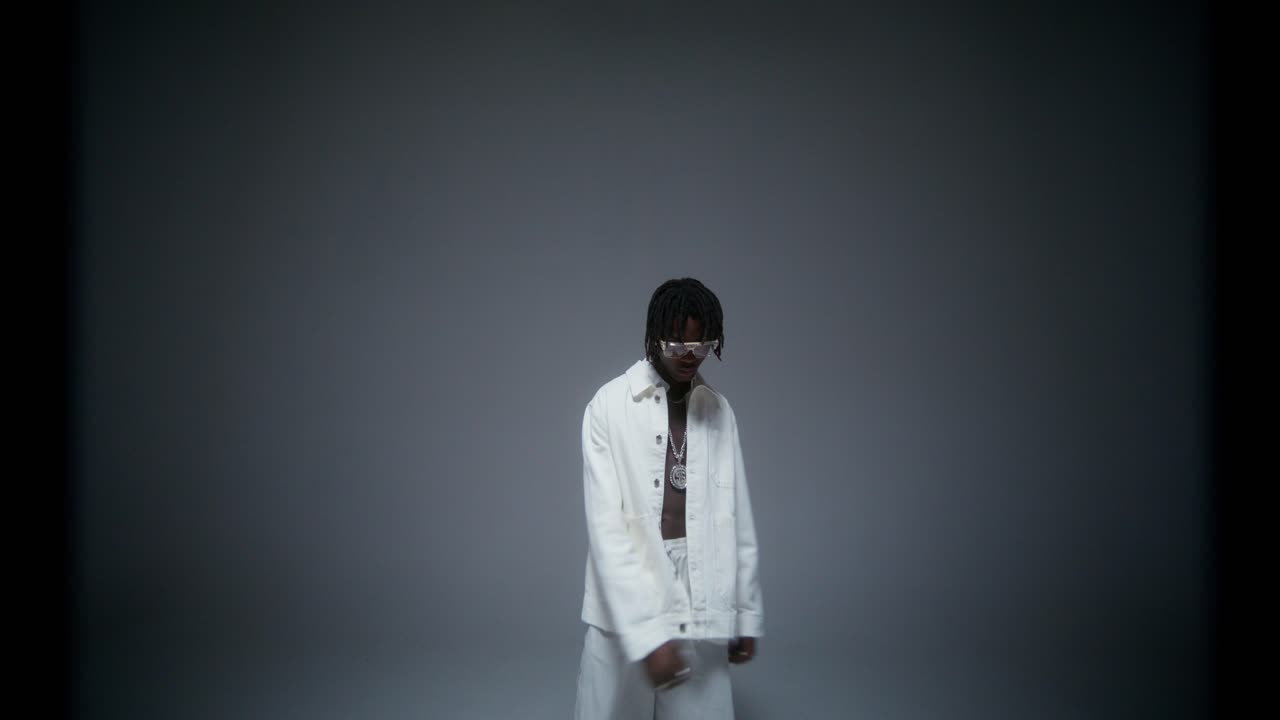 Stylish Man in White Outfit