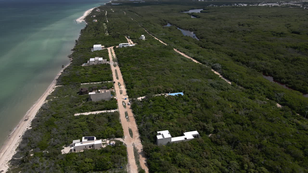 Sisal Aerial View 4K Empty Yucatan Beach On Mexican coast sunny day from the air
