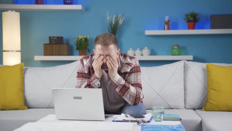 home office worker man has eye pain.