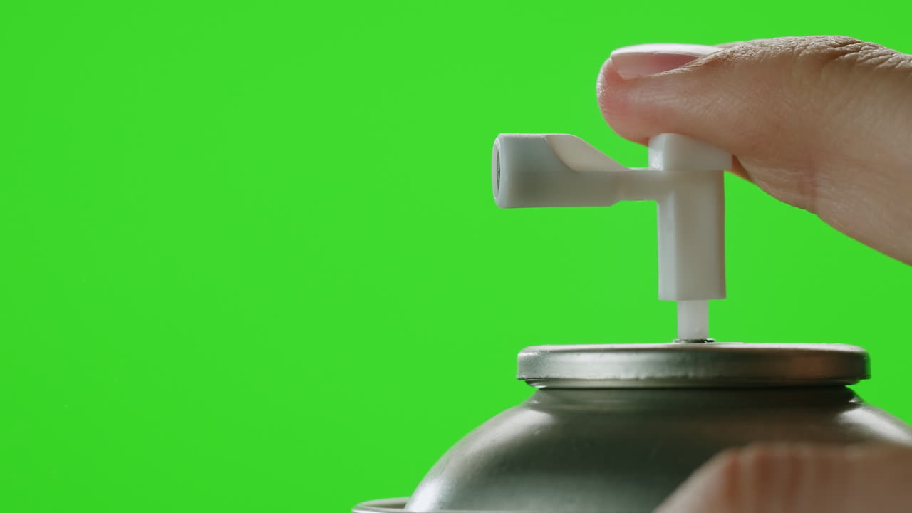 Person using an air freshener