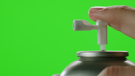 person using an air freshener