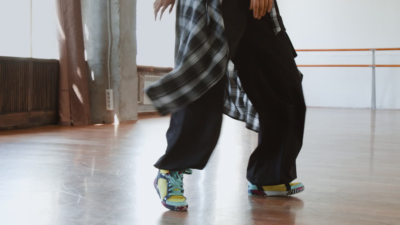Dancer's Legs and Feet in Motion in a Studio