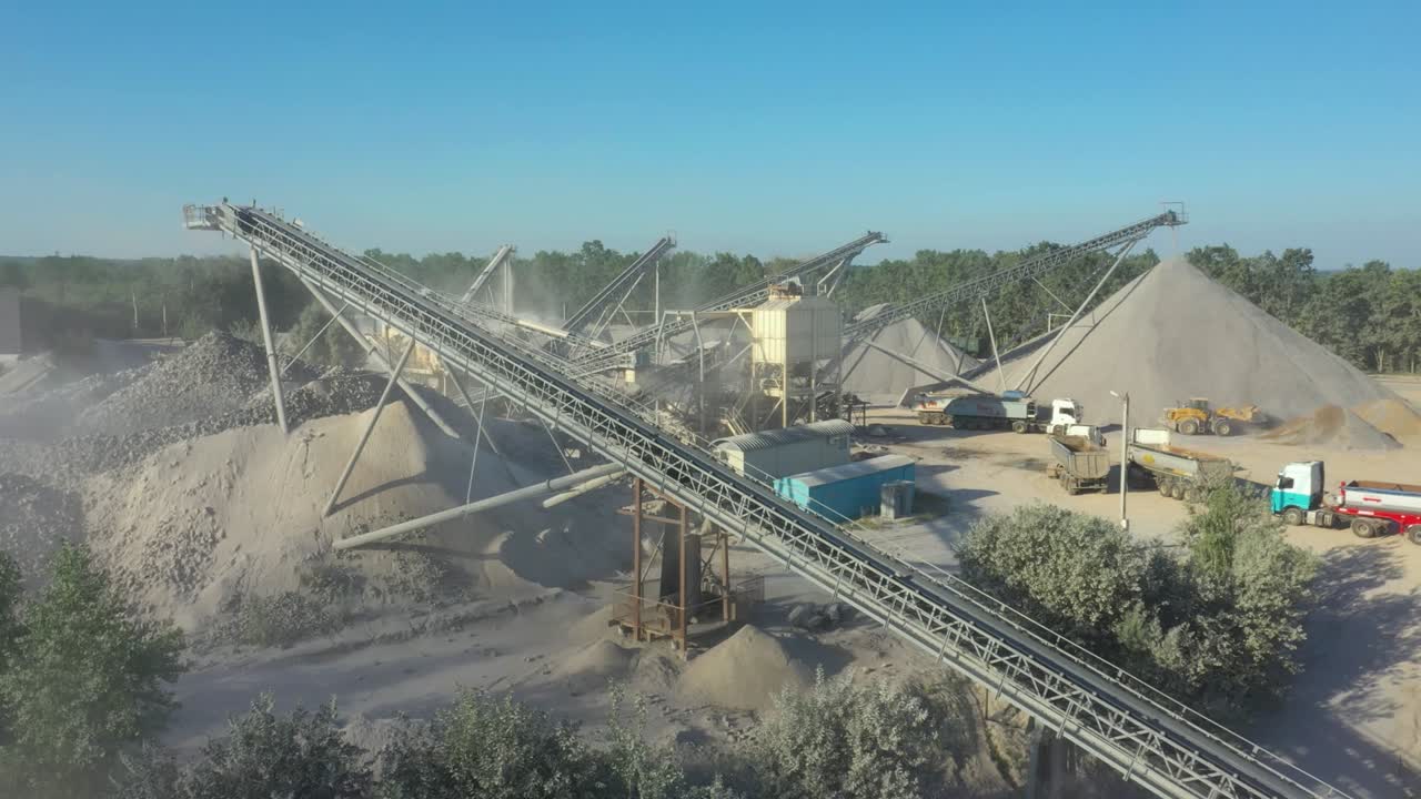 Granite quarry. Extraction of granite. Open cast mine. Stone Quarrying - Aerial view