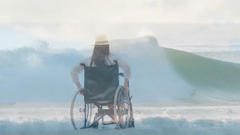 Animation-of-sea-landscape-over-disabled-cuacasian-woman-sitting-in-wheelchair