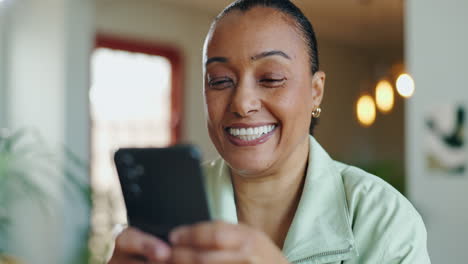 happy woman smiling and using phone