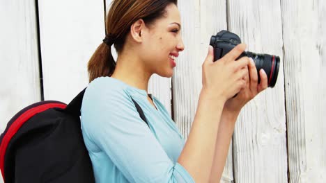 photographer taking photo with digital camera