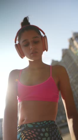 woman exercising outdoors in city