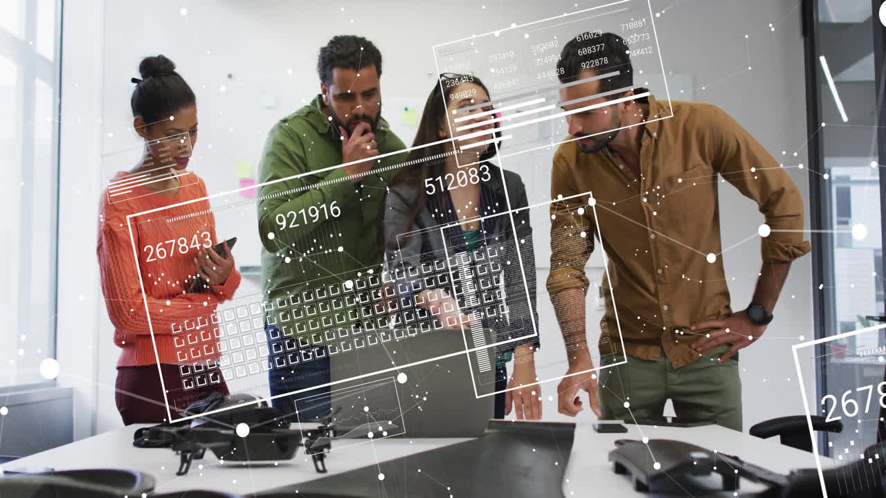 Analyzing data with digital interface, diverse team collaborating in modern office