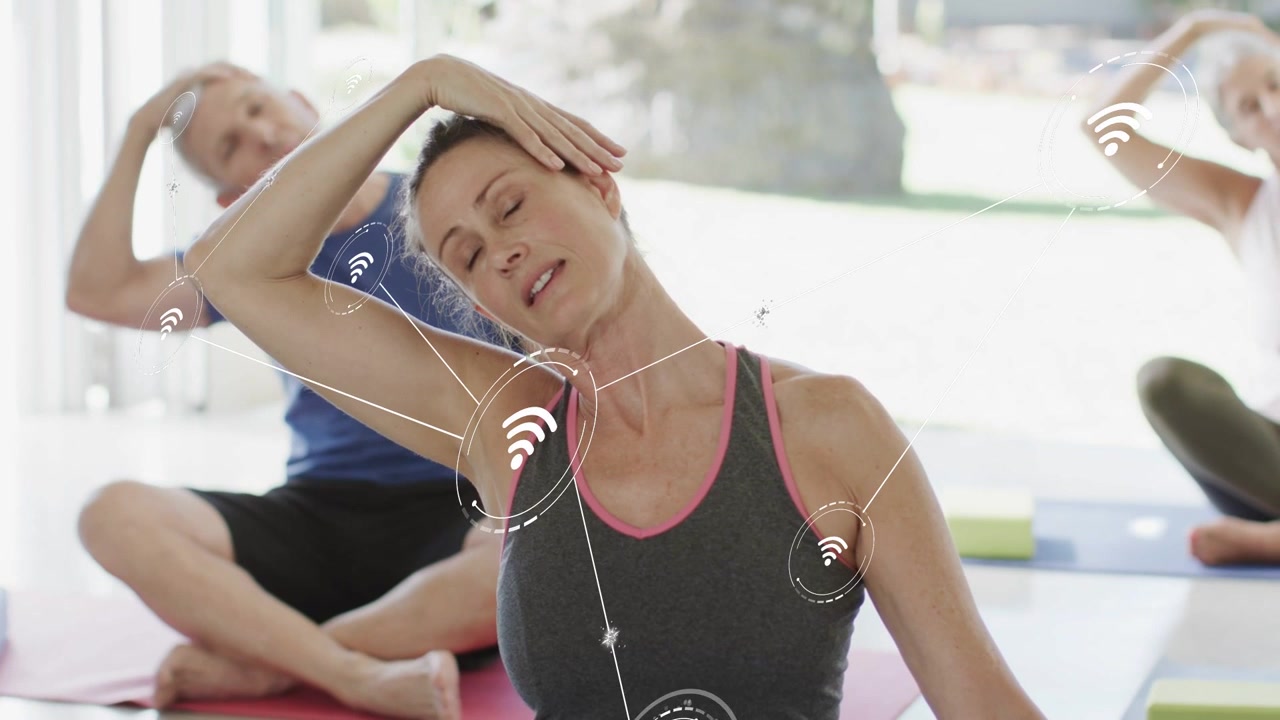 Yoga woman starting neck-to-overhead stretch, animating AR nodes tracking form as peers mirror