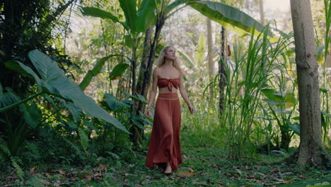 nature woman walking in forest enjoying natural beauty exploring lush tropical jungle alone 4k