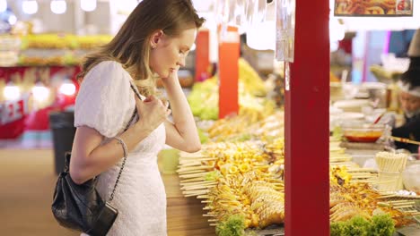 woman exploring a night market