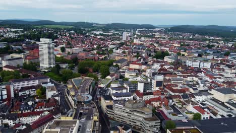 panoramic backwards aerial over kaiserslautern town center, germany