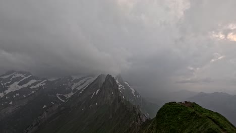 4k timelapse of rain clouds moving fast over famous schäfler ridge in appenzell region of switzerland