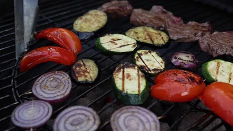 grilled vegetables and steak on barbecue