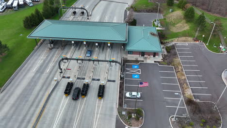 american flag at toll booth plaza