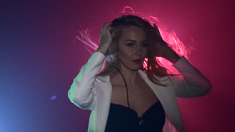 woman dj on stage in a club