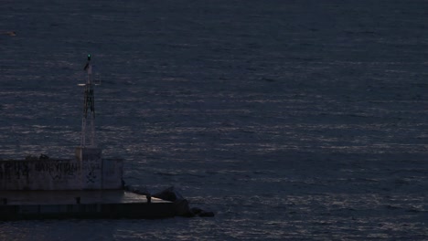 schooner sailing in sea at night