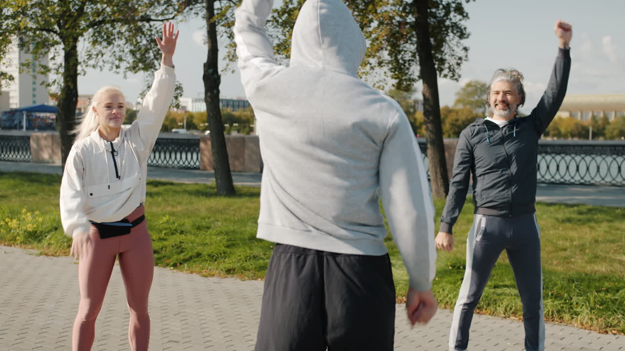 People Stretching Outdoors