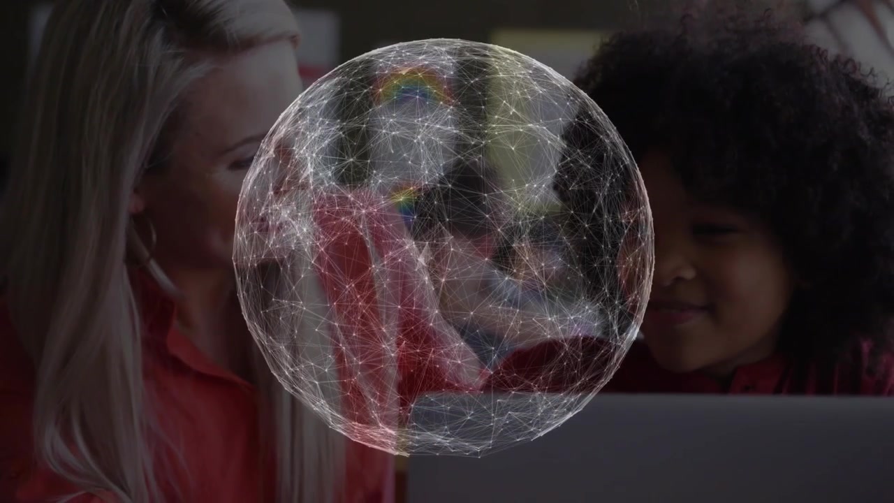 Adult woman guiding child at table, rotating globe appearing and showing laptop learning progress