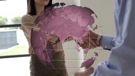 animation of globe over businessman handshake