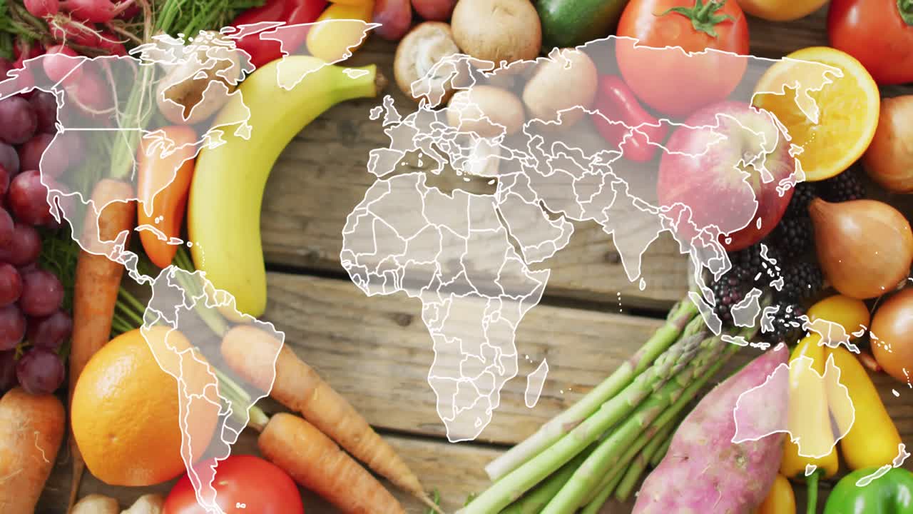 테이블 위 에 있는 과일 과 채소 위 에 있는 세계 지도 의 애니메이션