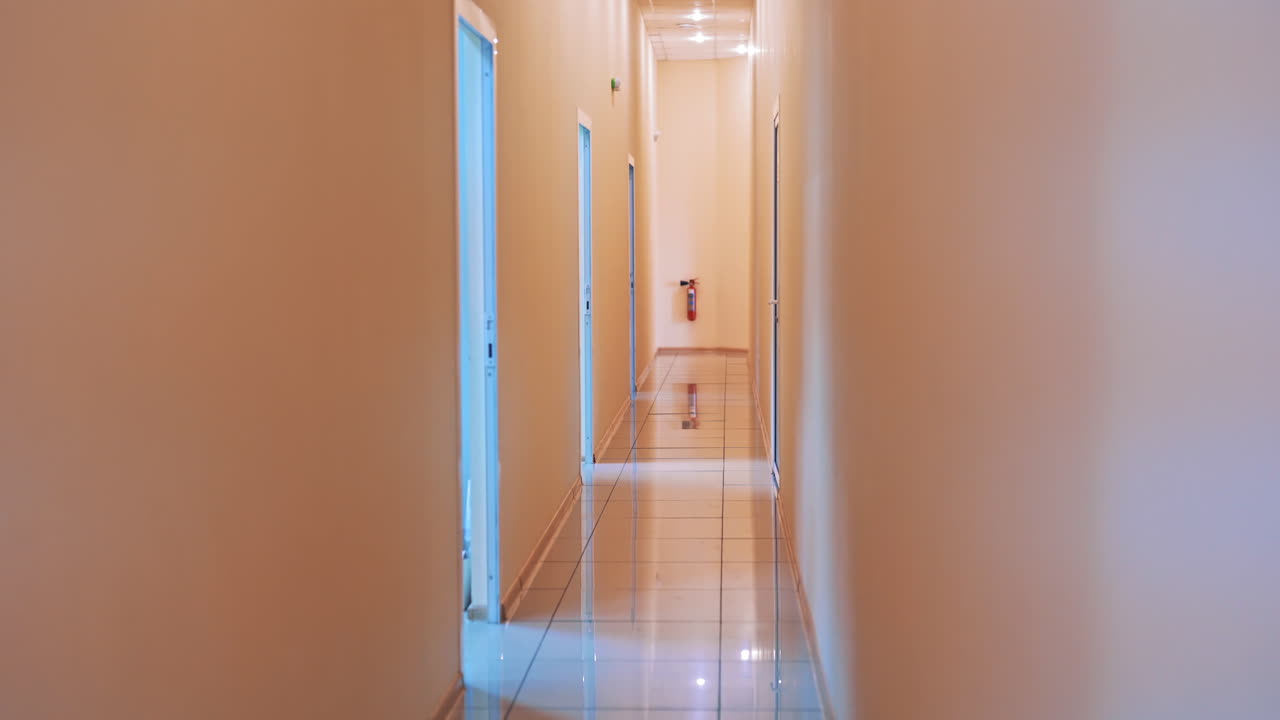 Modern building interiors. View of empty corridor in the modern office building
