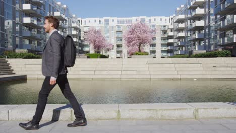 businessman - young urban professional business man walking to work