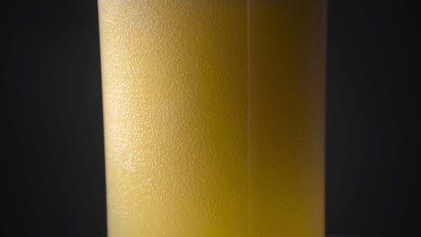 cloudy hazy pilsner ale beer being poured on a glass