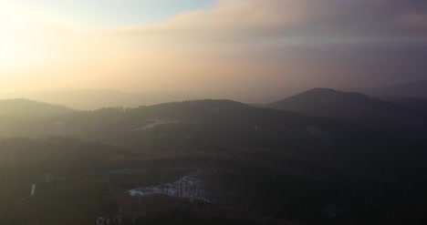 Aerial-View-Of-Woods-And-Mountains-In-Winter-3