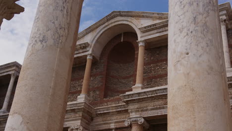 looking up at the ancient gymnasium through pillars in sardis