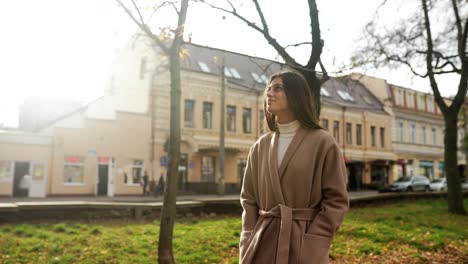 woman walking in autumn park