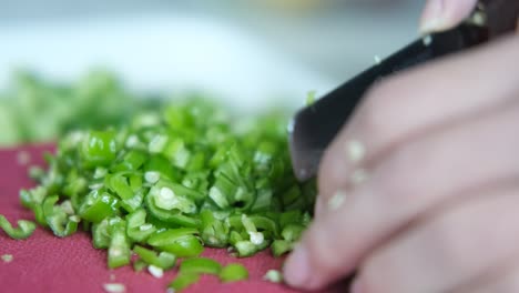 chop peppers on pink board