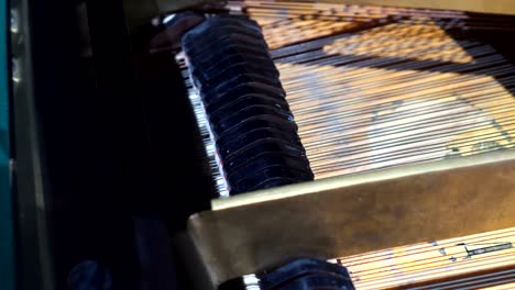 piano hammers playing keys closeup, music background