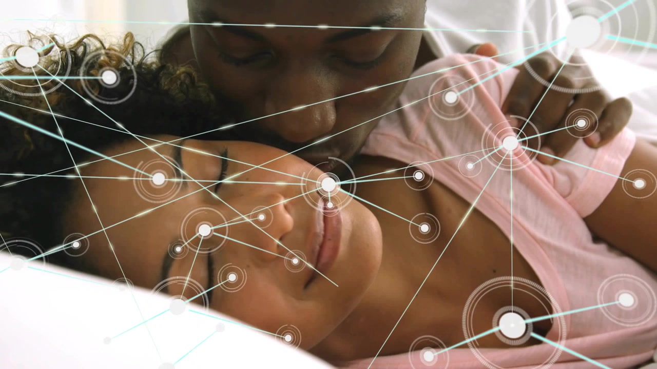 As man leaning and nuzzling woman's neck, HUD nodes starting near face and expanding, showing bond