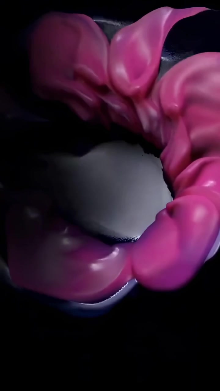 Animazione astratta di liquido nero e rosa lucido che scorre