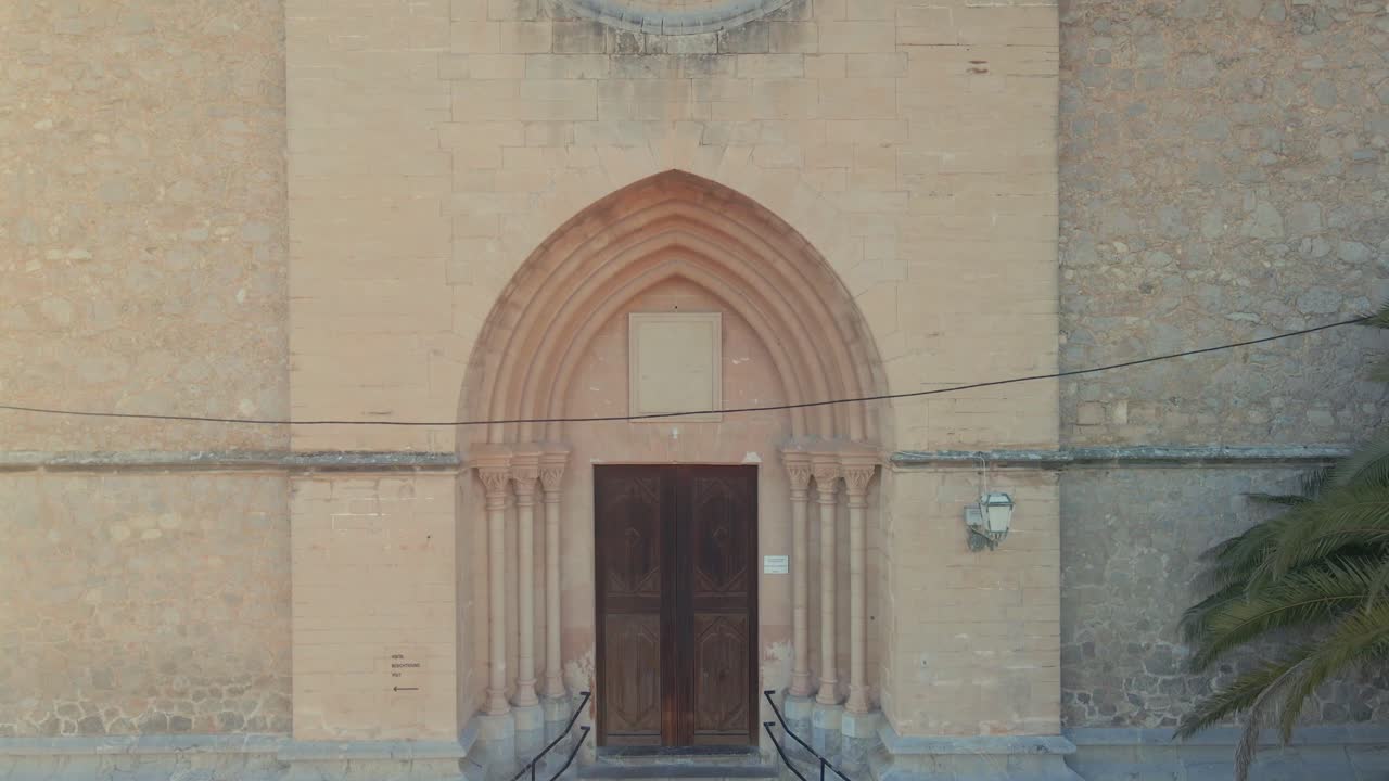 Step into the vibrant town of Arta in Mallorca, featuring beautiful stone architecture and historical sites. This picturesque location showcases the essence of Mediterranean life and culture.