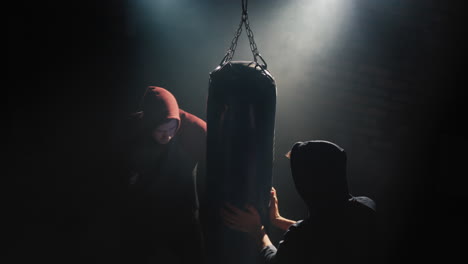 Boxer-trains-with-partner-in-the-gym