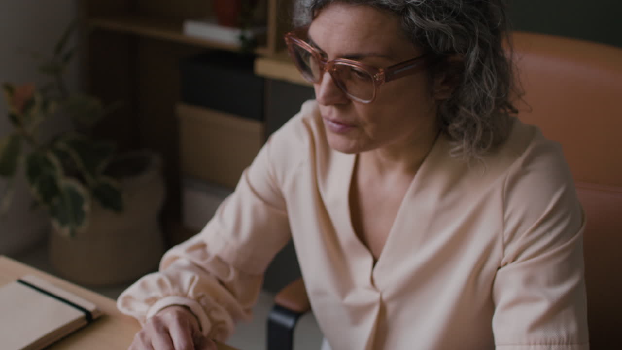 Woman working at her home office