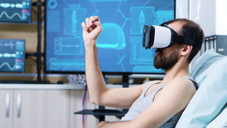 patient with virtual reality goggles in a modern facility for brain research