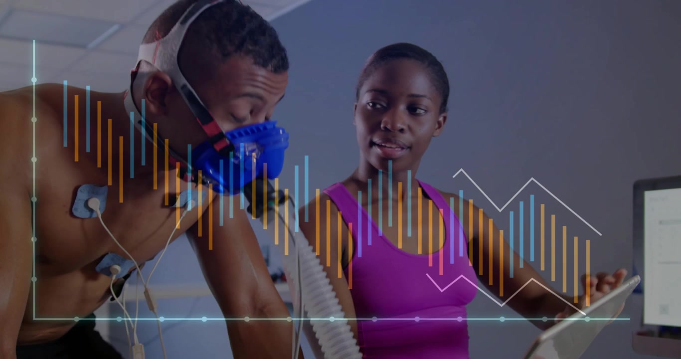 Mand starter test, hvilket får tekniker til at trykke på tablet, bølgeformer skifter, maske og EKG til medicinsk test.