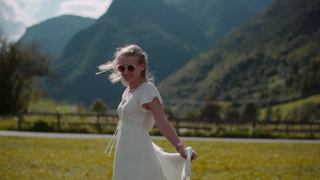 Happy Woman Walking in Alpine Mountain Landscape