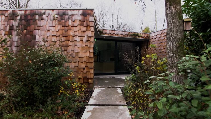 The outside of a modern vintage wooden house