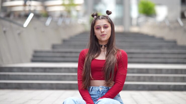 Teenage Girl Sitting on Stairs