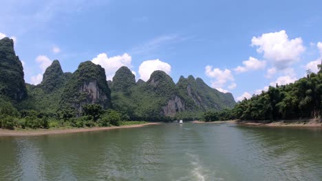 magnificent li river karst landscape as seen from the deck of passenger boat sailing from guilin to yangshuo, china