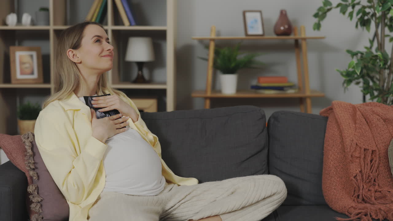 Pregnant Woman Looking at Ultrasound