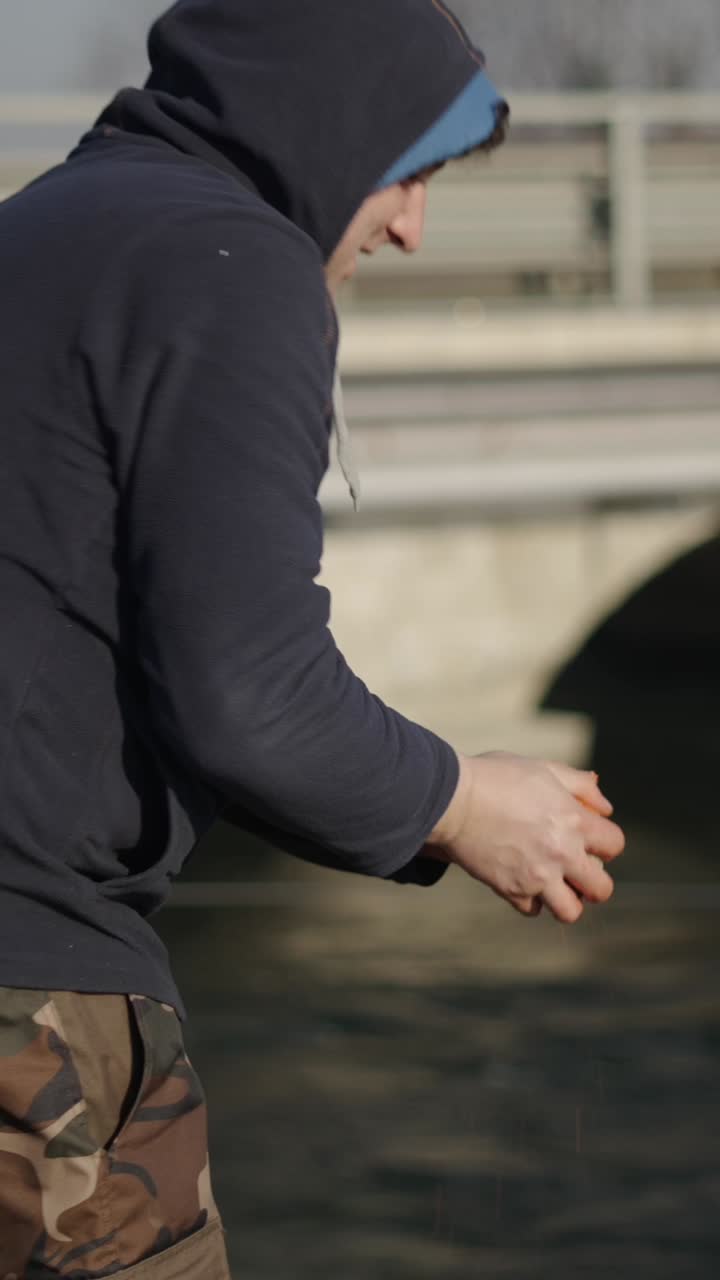 Fisherman fishing in a rural environment